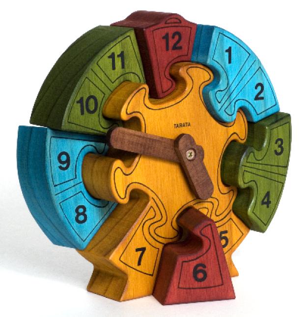 TARATA Clock - Colour - Large A beautiful puzzle for younger children. Made from untreated NZ Pine & non-toxic colours