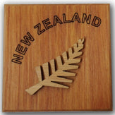 TARATA Magnet - Fern/NZ Block Made in New Zealand 
Solid Rimu with lasered bamboo icons.  
Size 5cm x 5cm x 1.5cm
